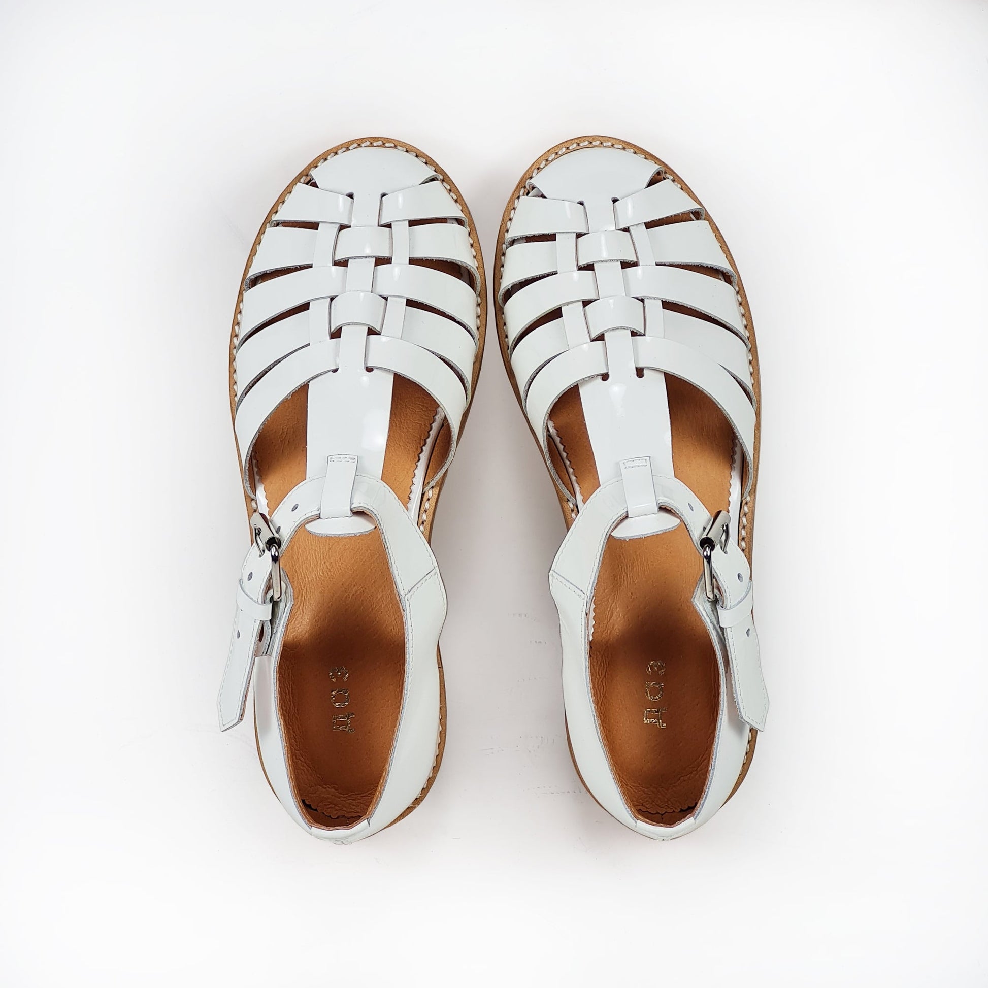 Timeless Elegance with Fishermen-Style Handmade Leather Sandals by Daz Studio at www.brixbailey.com