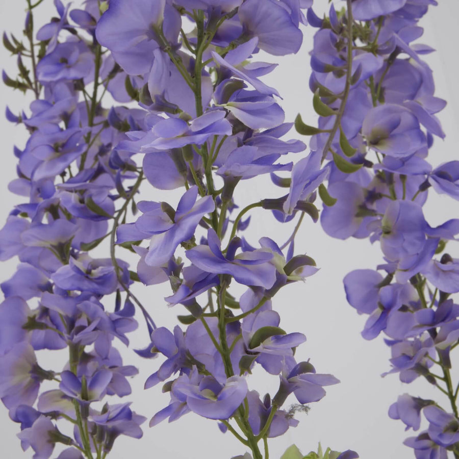 180cm artificial wisteria spray with deep purple blooms and green accents for elegant home decor by Sostter at brixbailey.com