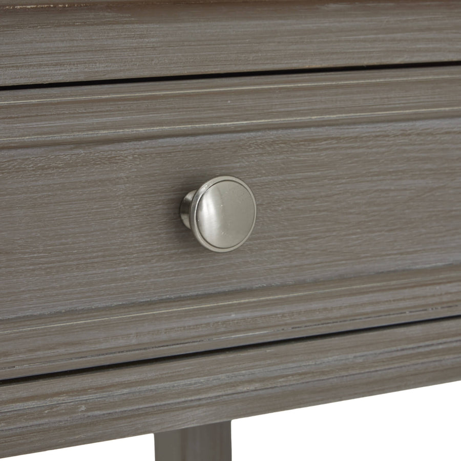 Distressed grey four-drawer console table with solid wood construction and transitional design for living room storage. by Sostter at brixbailey.com