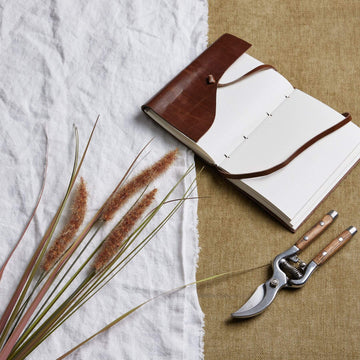 Three lifelike terracotta grass stems in warm brown, 80cm tall, for rustic or boho home decor by Sostter at brixbailey.com