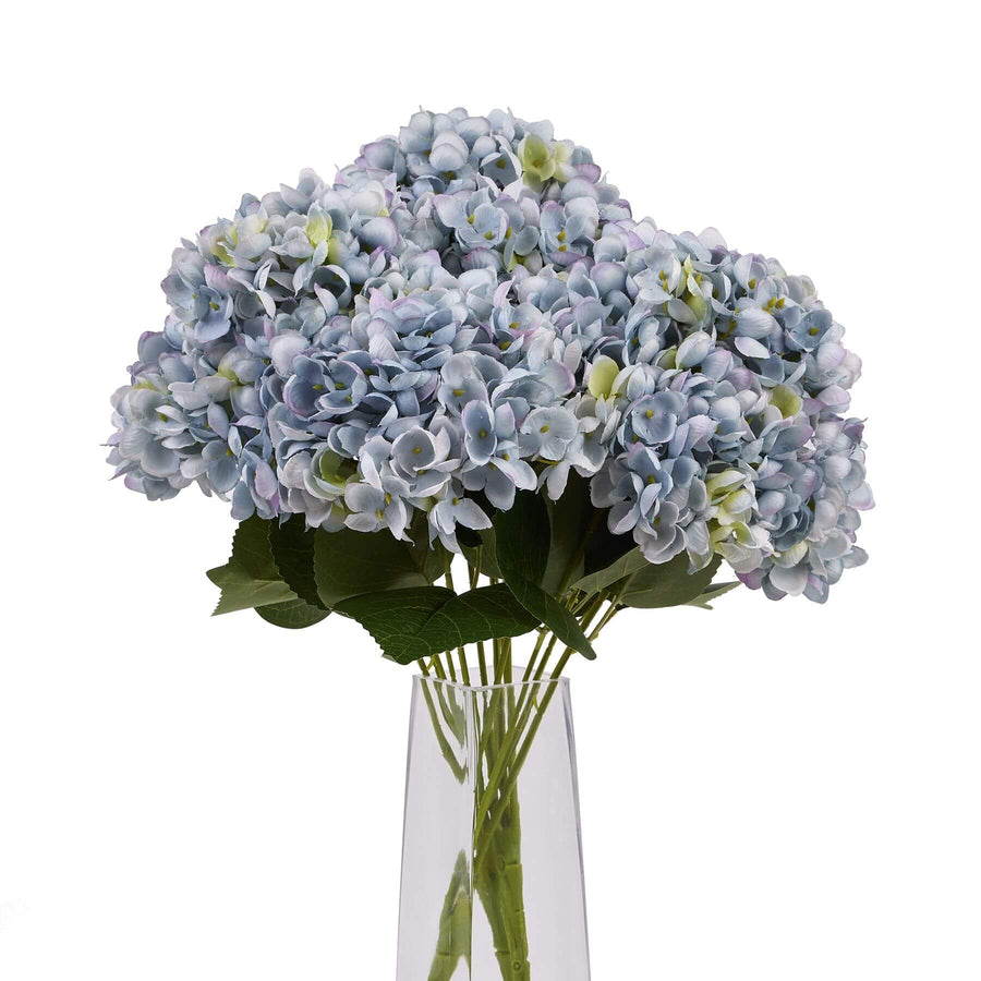 Lifelike blue hydrangea stems in rich hue, perfect for vases or home decor, crafted from durable plastic for realistic texture by Sostter at brixbailey.com