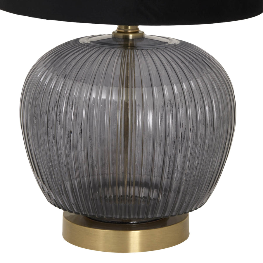 Luxton table lamp with ribbed glass base and black velvet shade for elegant home lighting by Sostter at brixbailey.com