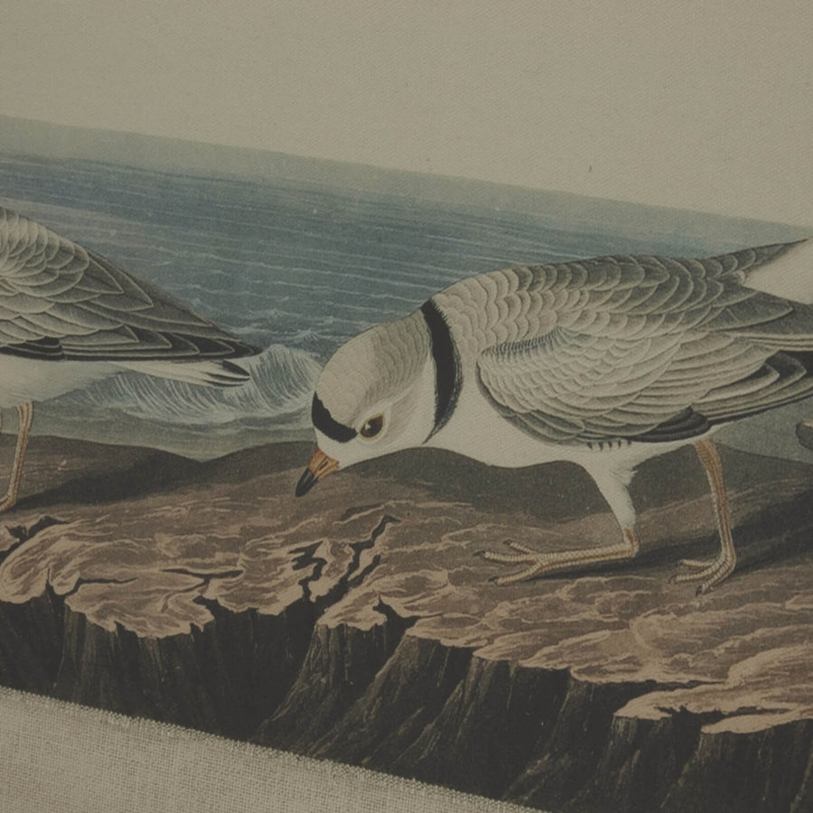 Handcrafted linen wall art with shorebird design, earthy brown tones, and glass bead frame for coastal decor. by Sostter at brixbailey.com