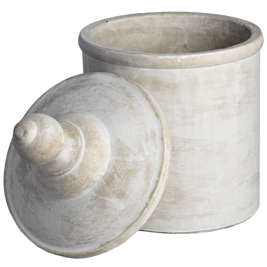 Antique white stone canister with rustic texture, perfect for kitchen storage or home decor accent. by Sostter at brixbailey.com