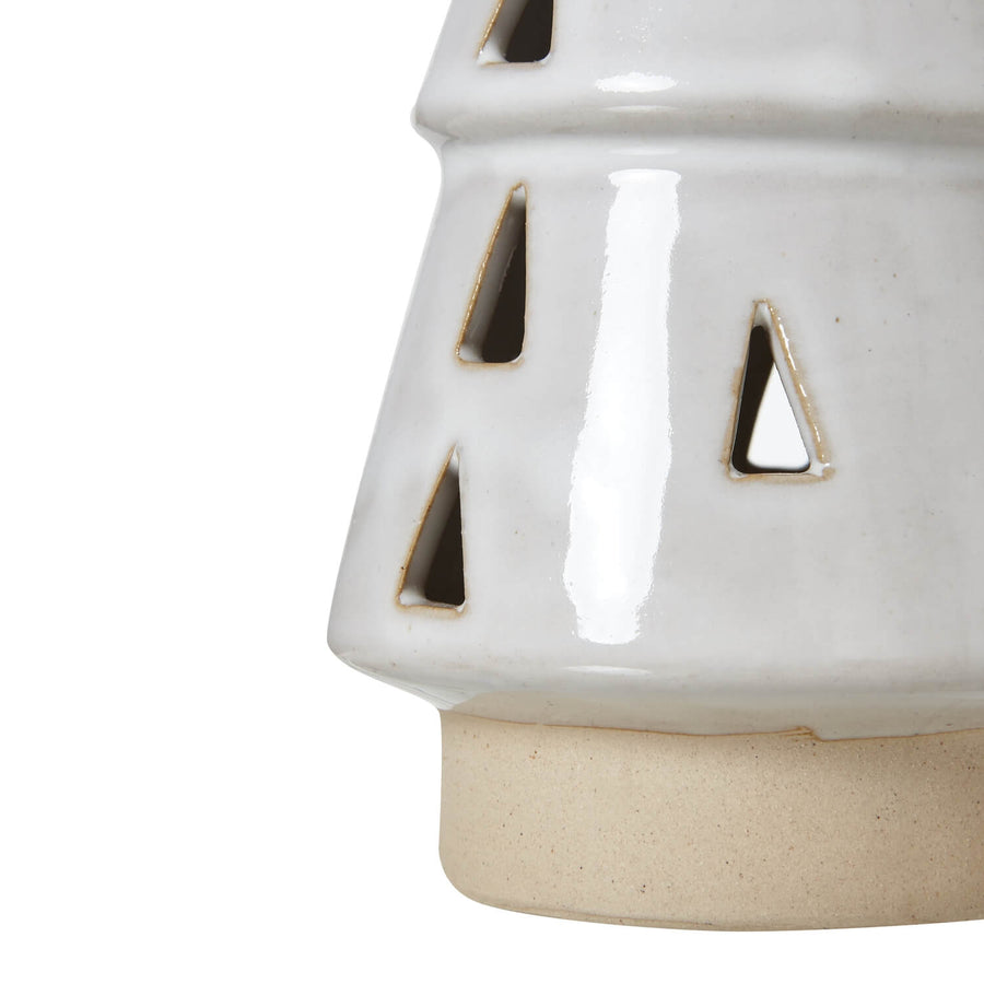 Handcrafted white ceramic LED light tree with geometric cut-outs, casting warm ambient glow for home decor. by Sostter at brixbailey.com