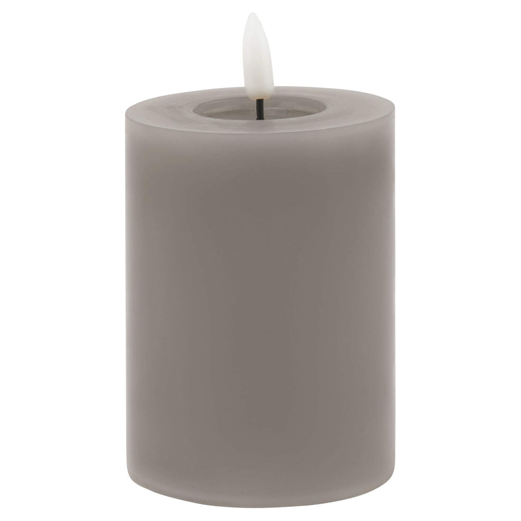 Grey LED wax candle with realistic flicker effect, battery-operated for flameless ambiance  by Sostter at brixbailey.com