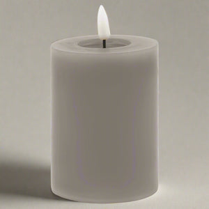 Grey LED wax candle with realistic flicker effect, battery-operated for flameless ambiance  by sostter at brixbailey.com