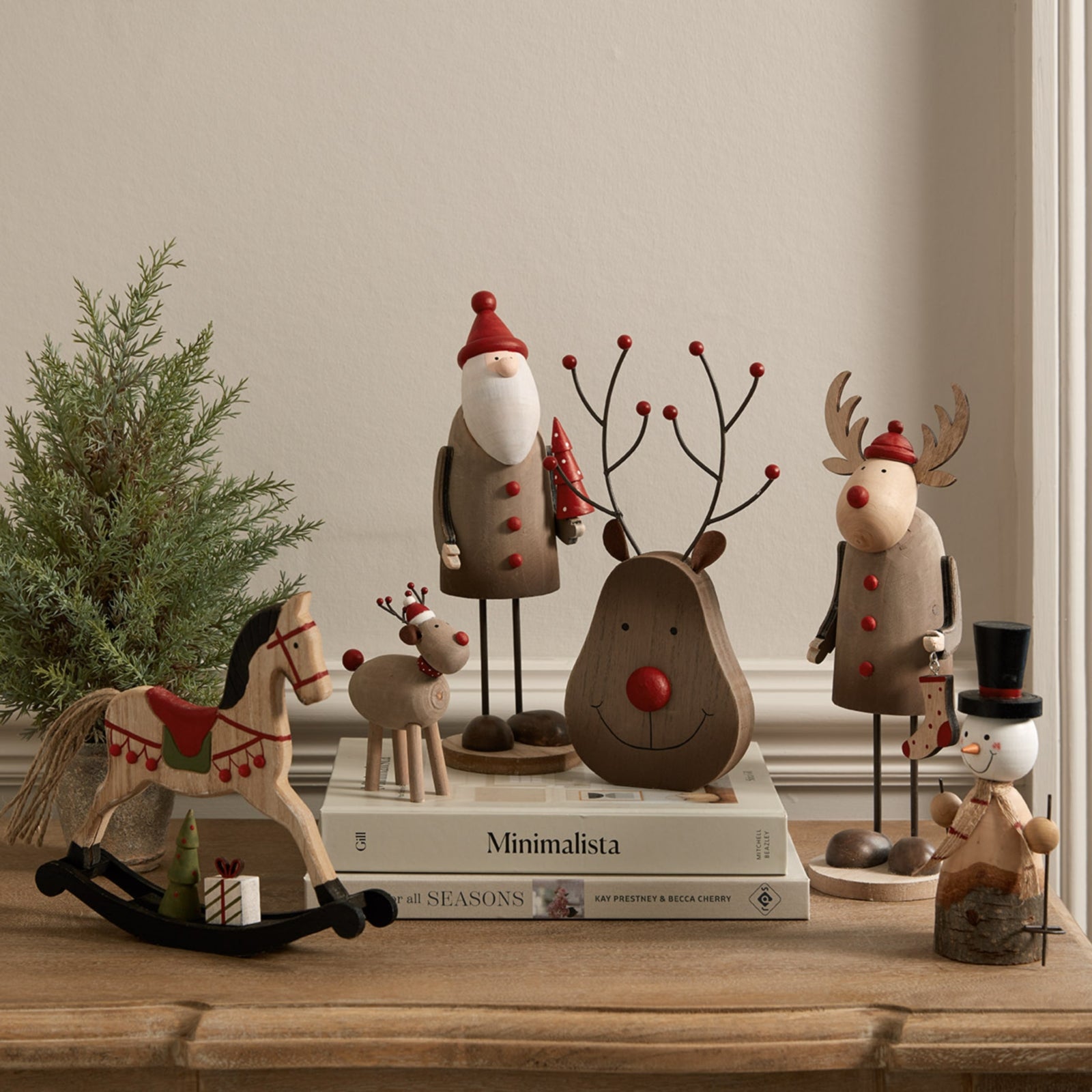 elegant rustic metal reindeer ornament with a tiny stocking, showcased in soft ambient light