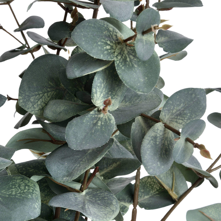Lifelike variegated faux eucalyptus stem in sage green, handcrafted with ultra-realistic plastic leaves for home decor. by Sostter at brixbailey.com