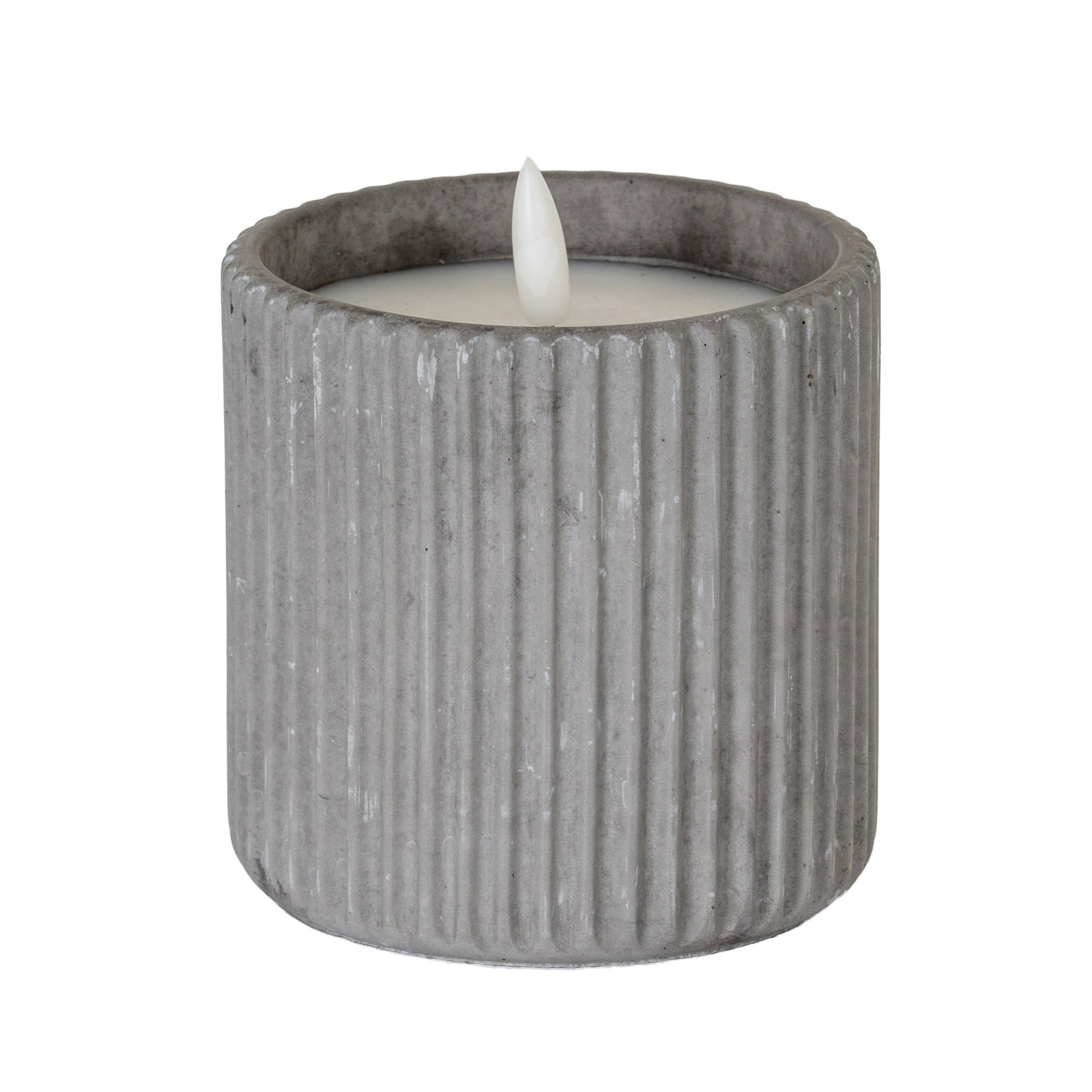bold grey ribbed led candle casting dramatic shadows with its warm natural glow