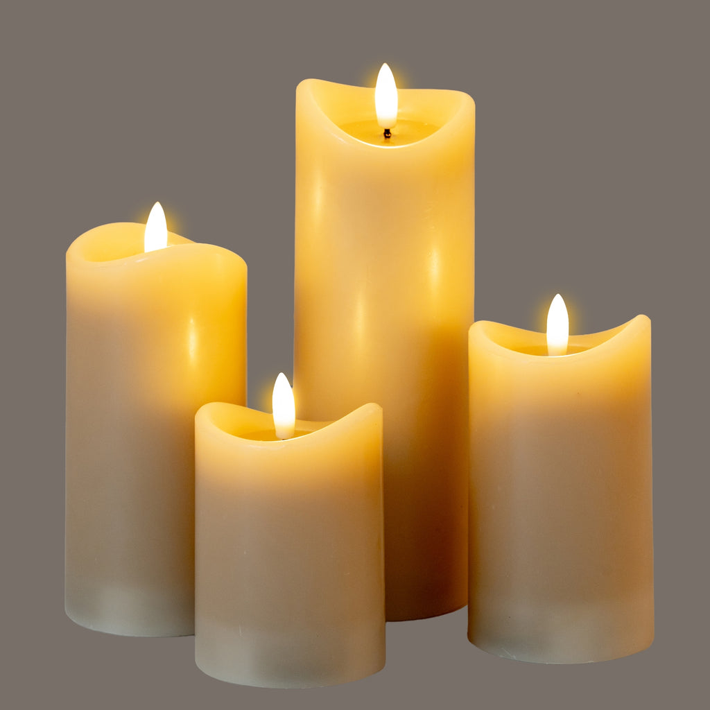 elegant taupe led candle with a softly melted top casting a warm, refined glow on a minimalist table