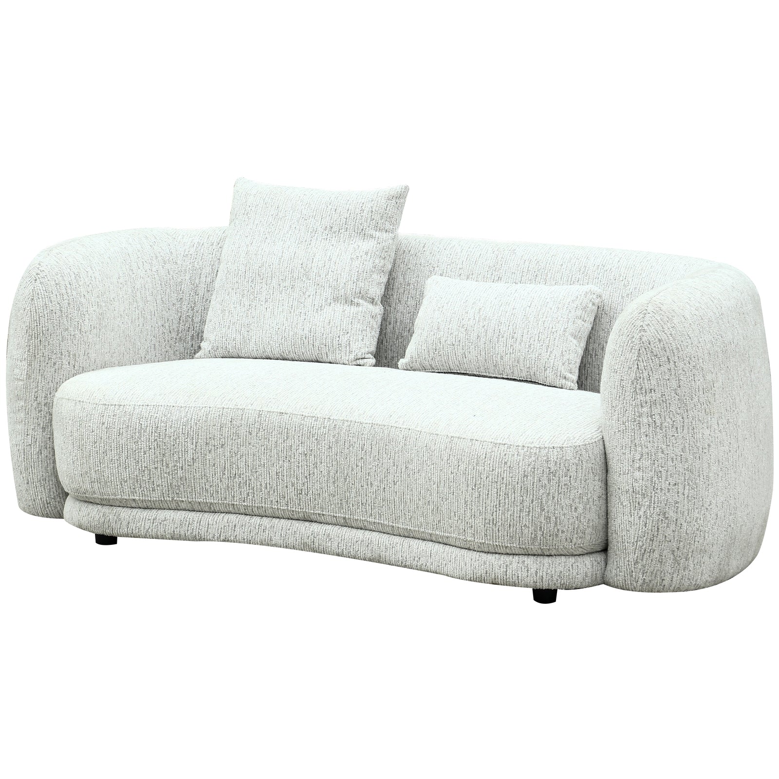 bold white two-seater sofa with soft cushions in dramatic studio lighting