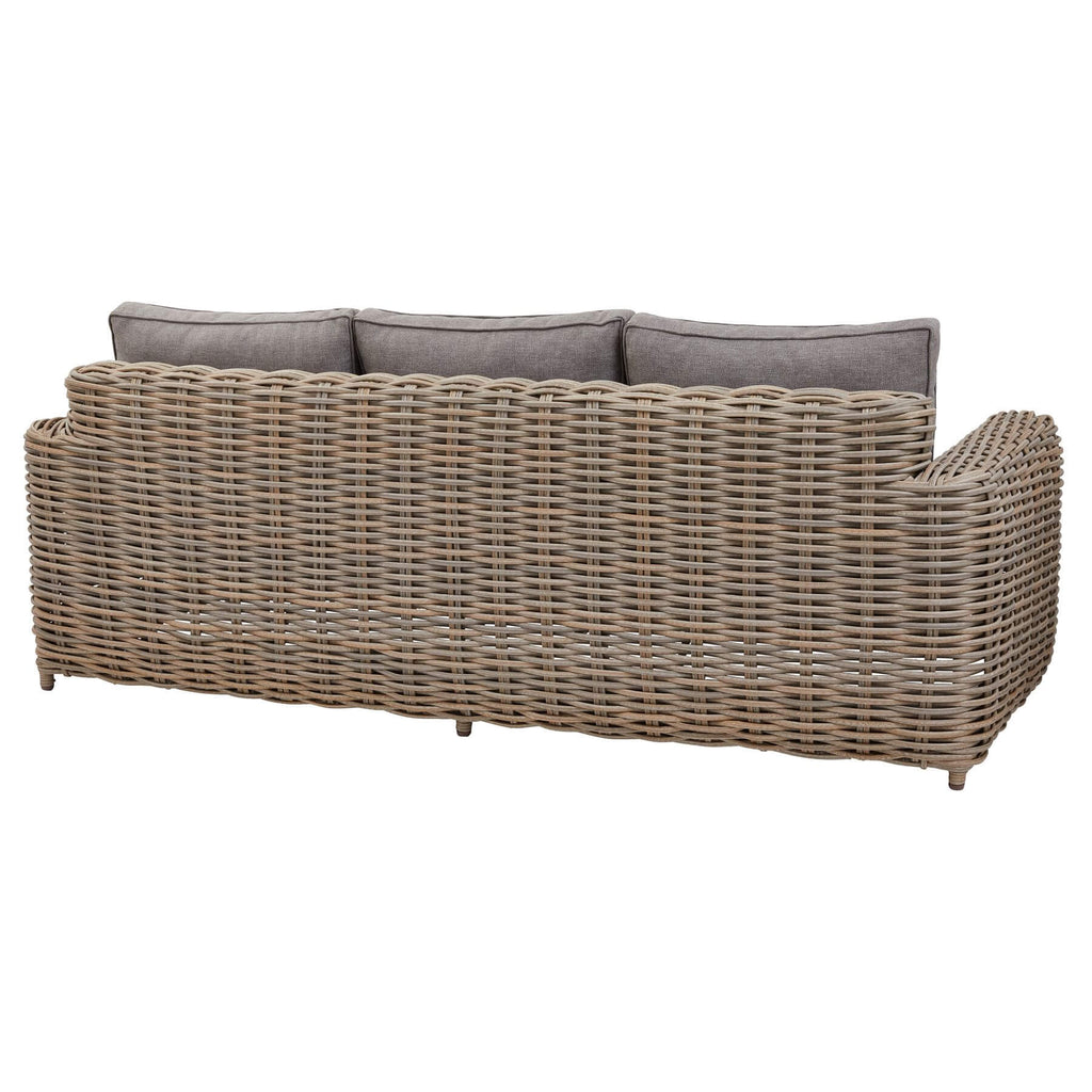 Premium beige outdoor wicker set with coffee table and Olefin cushions on patio by Sostter at brixbailey.com