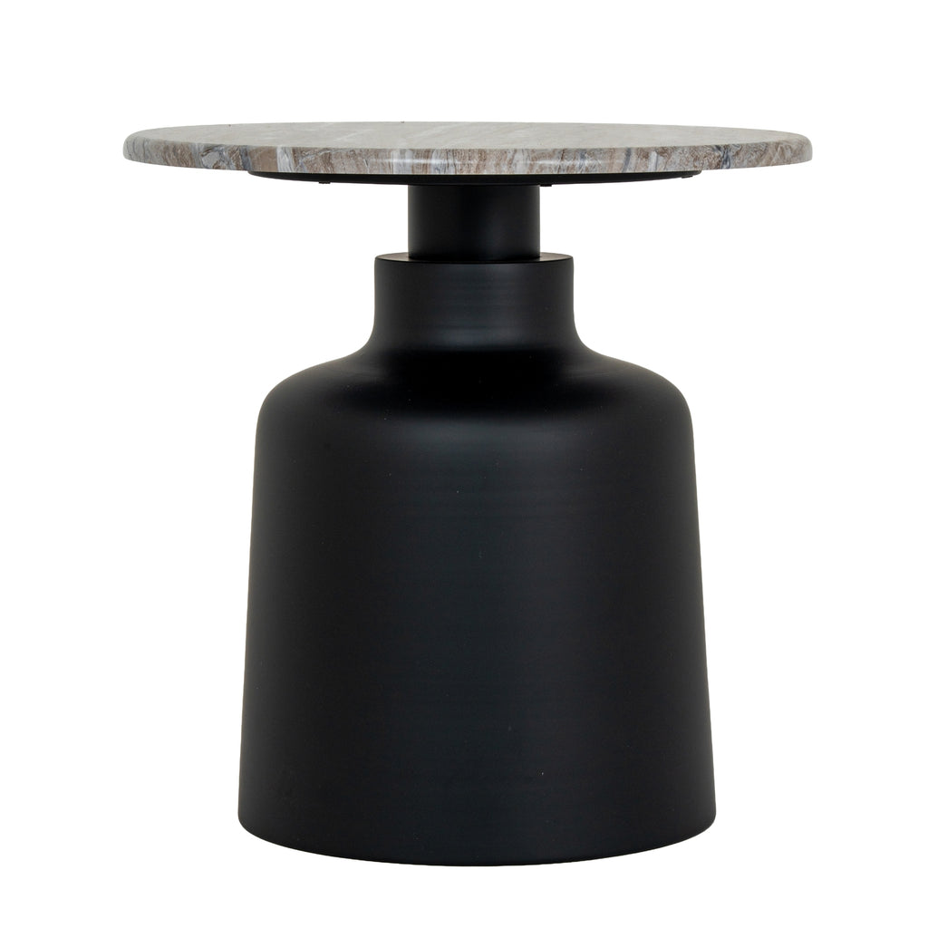 a softly lit black metal side table with a gentle glow on its smooth circular top