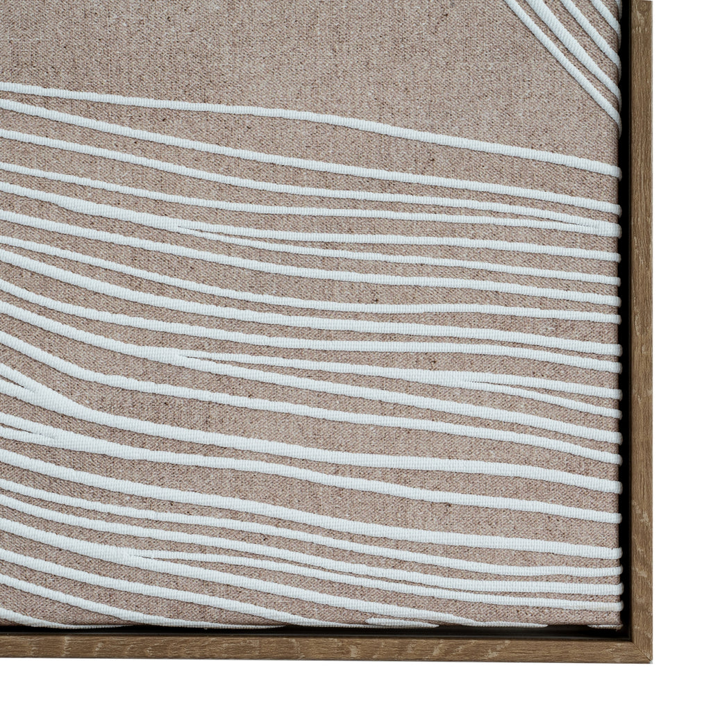 a soft-focused minimalist line art print in a warm wood frame, glowing in gentle morning light