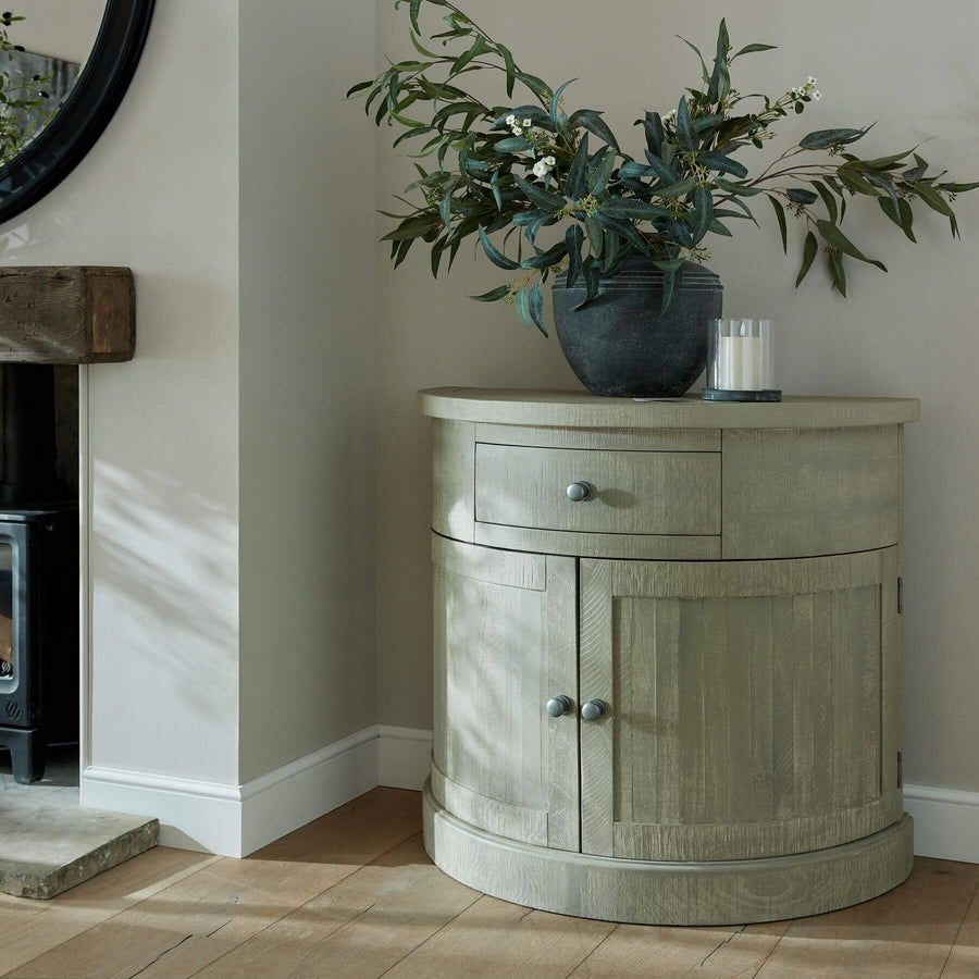 Hand-finished half-moon cupboard in warm grey weathered pine with curved modern organic design and Scandinavian influences by Sostter at brixbailey.com