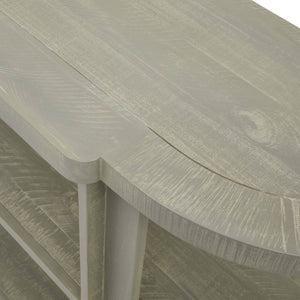 Hand-finished grey-washed pine console table with organic curves, natural wood grain, and contemporary artisan design. by RoomLondon at brixbailey.com