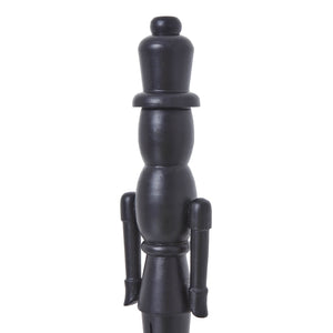 Black wooden Nordic nutcracker with minimalist design, 50cm tall, for modern Christmas decor by sostter at brixbailey.com