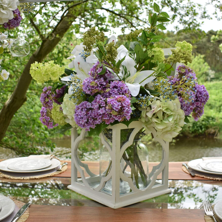 Lifelike artificial hydrangea stem in soft green, 50cm tall, with realistic petals and leaves for elegant home decor by Sostter at brixbailey.com