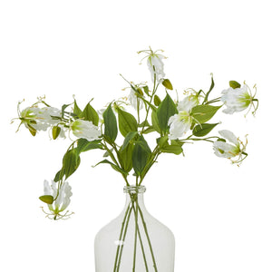 Lifelike white and green Gloriosa Lily floral spray with curling petals, tropical faux flower for home decor by sostter at brixbailey.com