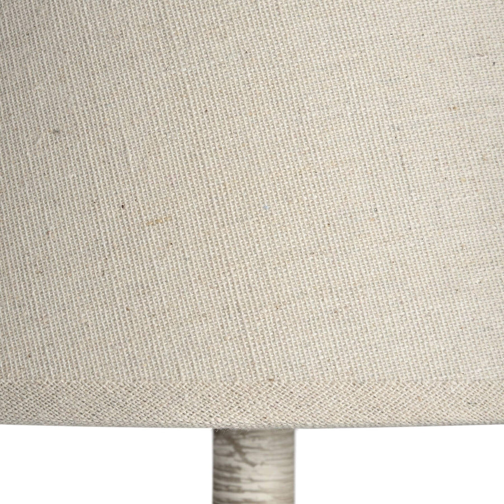 Handcrafted rustic shaker table lamp with grey-washed wood base and neutral linen shade for ambient lighting. by Sostter at brixbailey.com