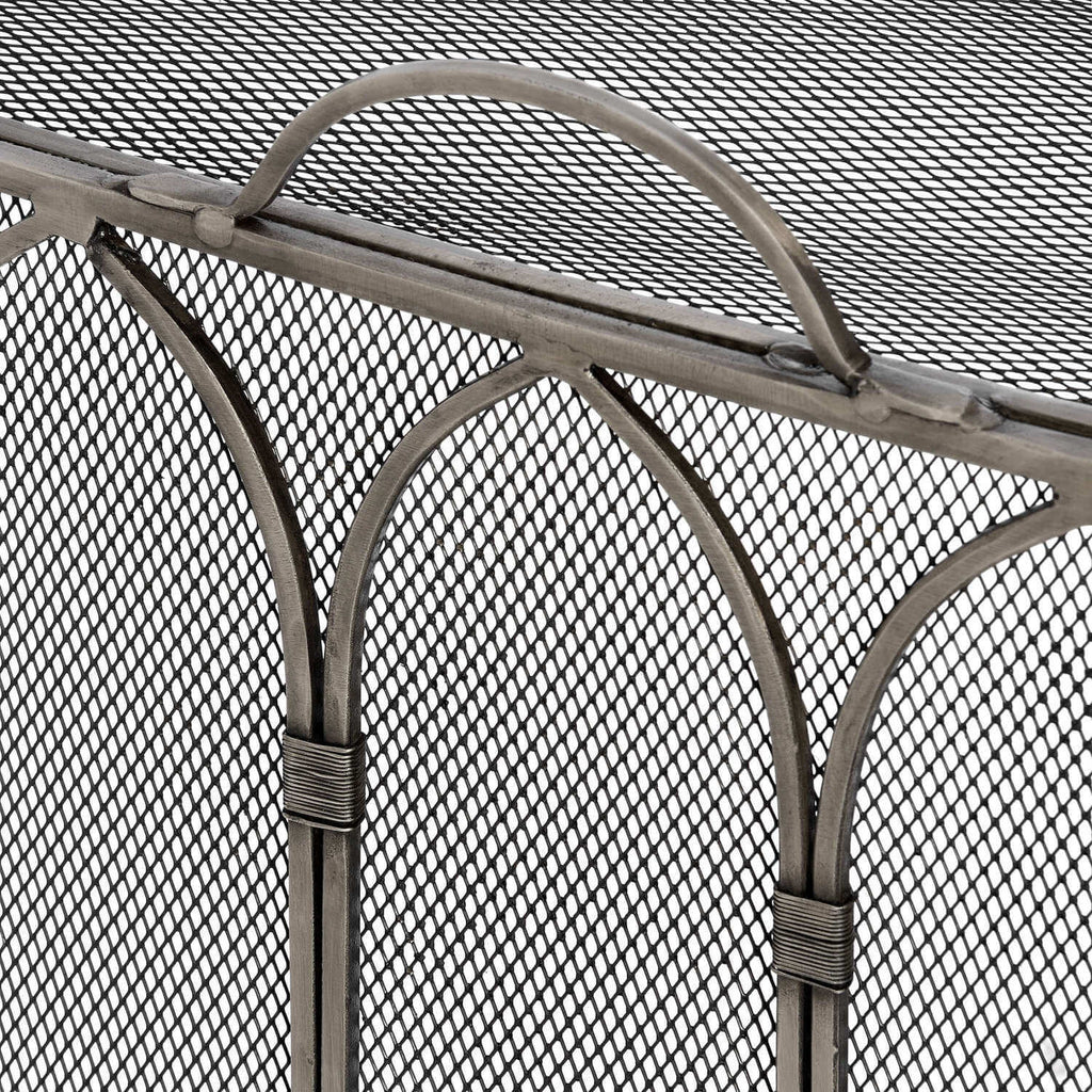 Handcrafted black metal Gothic firescreen with peaked arch design, spark protection for fireplace safety. by Sostter at brixbailey.com