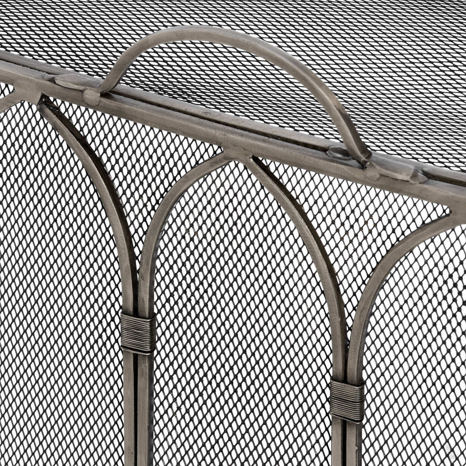 Handcrafted black metal Gothic firescreen with peaked arch design, spark protection for fireplace safety. by Sostter at brixbailey.com