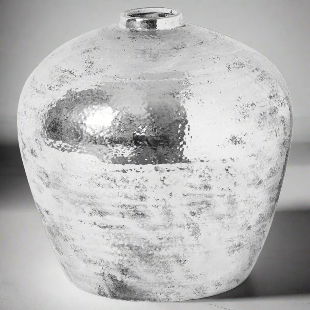 Hammered silver ceramic vase with reflective metallic finish, modern home decor centerpiece by Sostter at brixbailey.com