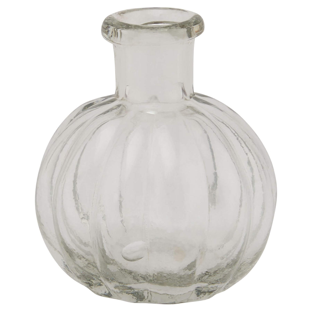 Clear glass bud vase, minimalist modern design, 6cm cube shape for single stems or small floral arrangements by Sostter at brixbailey.com