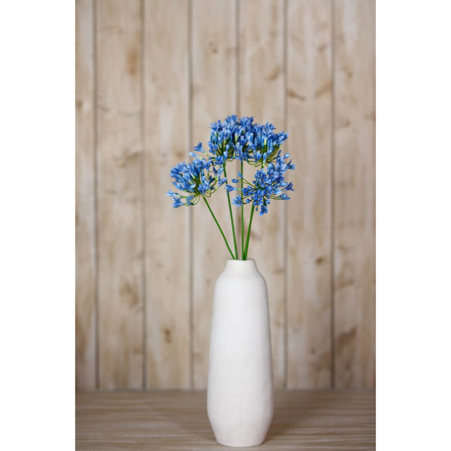 Blue Agapanthus artificial stem with vibrant true blue petals, lifelike botanical details, and 75cm height for home decor. by Sostter at brixbailey.com