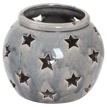 Handcrafted grey ceramic Nordic star lantern with distressed glaze, casting intricate shadow patterns when lit. by Sostter at brixbailey.com