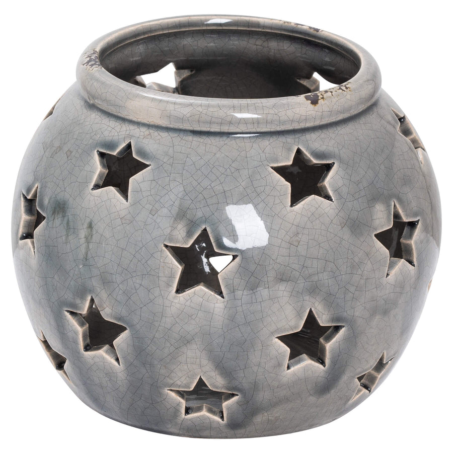 Handcrafted grey ceramic Nordic star lantern with distressed glaze, casting intricate shadow patterns when lit. by Sostter at brixbailey.com