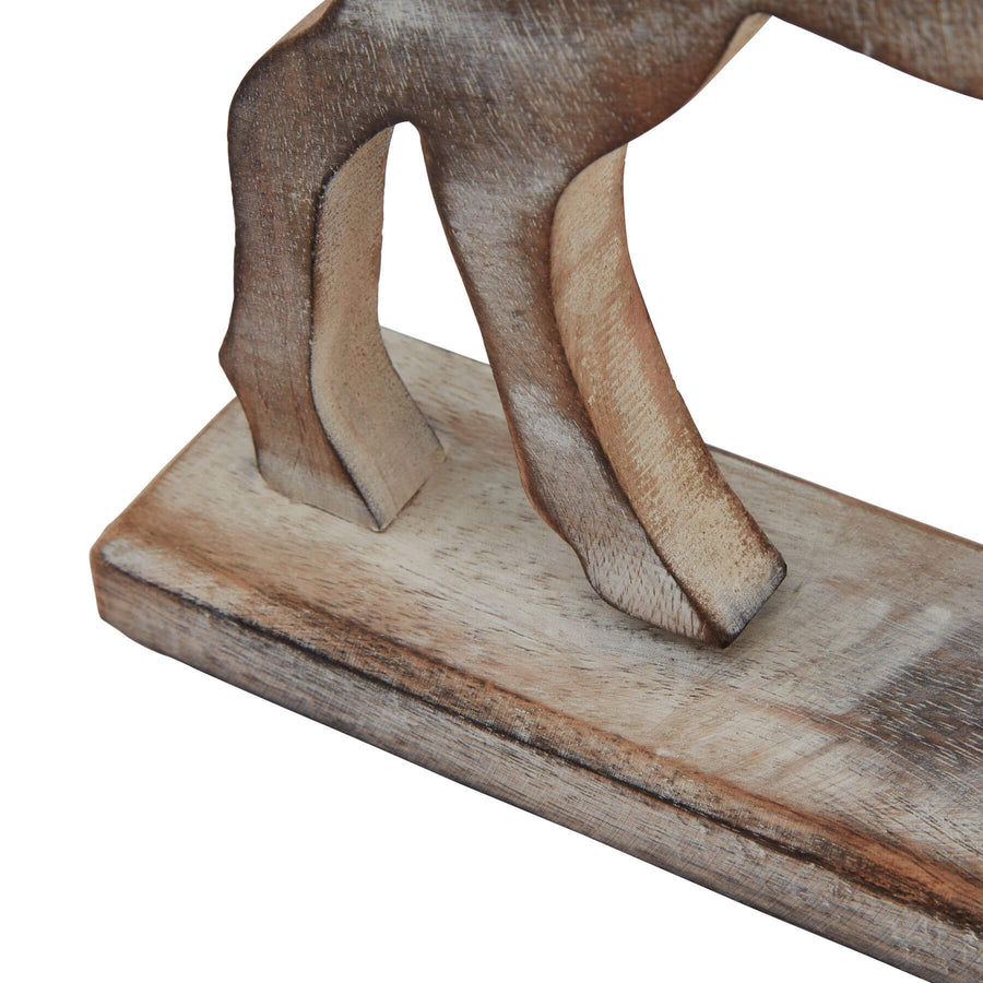 Handcrafted white-washed wooden reindeer decor with Scandinavian design and rustic distressing for holiday or year-round styling by Sostter at brixbailey.com