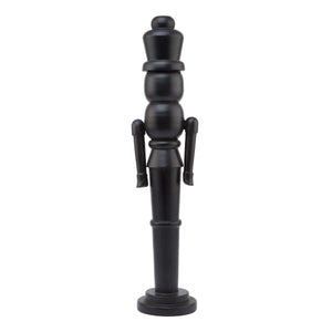 Black Scandinavian nutcracker with minimalist design, 60cm tall, matte wood finish for modern Christmas decor by sostter at brixbailey.com
