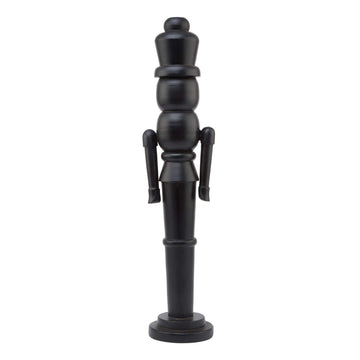 Black Scandinavian nutcracker with minimalist design, 60cm tall, matte wood finish for modern Christmas decor by Sostter at brixbailey.com