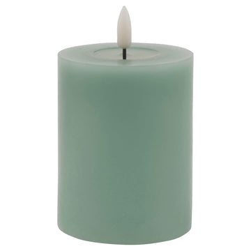 Sage green LED wax candle with realistic drips, flameless ambiance for modern decor  by Hill Interiors at brixbailey.com