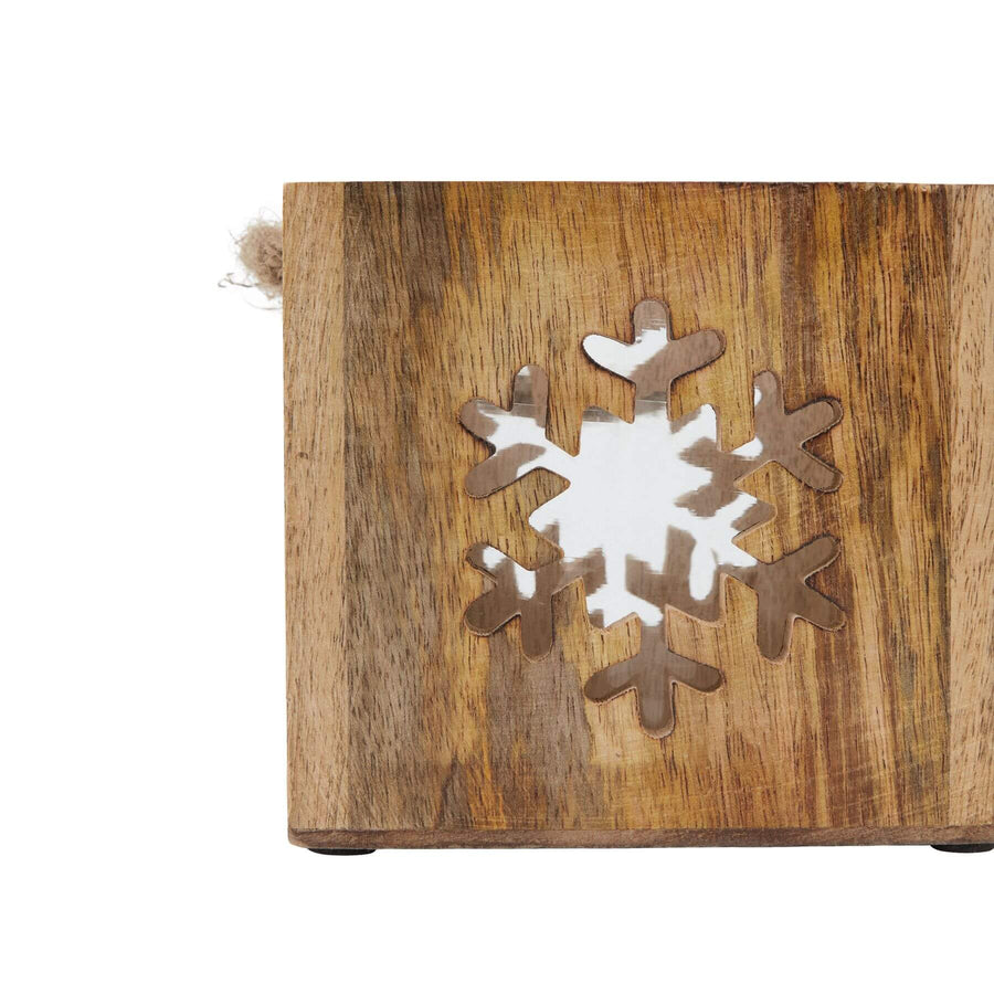 Handcrafted wooden snowflake tealight holder with glass insert, warm brown rustic decor for winter ambiance by Sostter at brixbailey.com