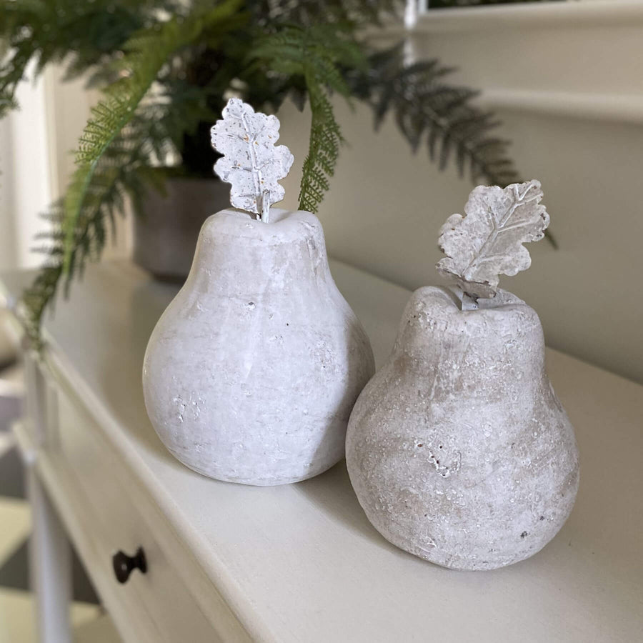 Handcrafted cream stone pear sculpture with weathered finish, 18cm tall, for modern decor by Sostter at brixbailey.com
