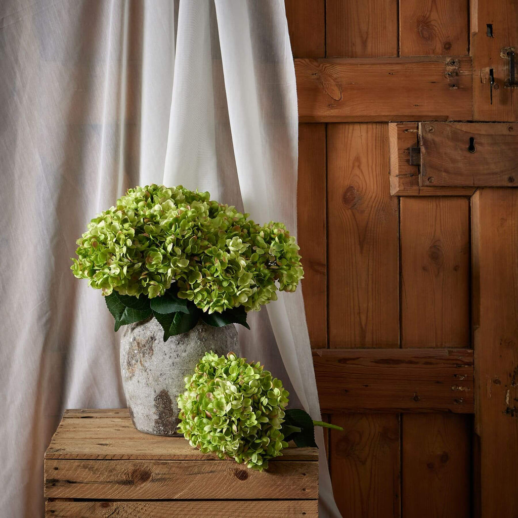 Hand-painted green hydrangea artificial floral arrangement with realistic shading and durable plastic stems. by Sostter at brixbailey.com