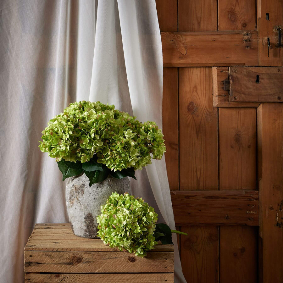 Hand-painted green hydrangea artificial floral arrangement with realistic shading and durable plastic stems. by Sostter at brixbailey.com