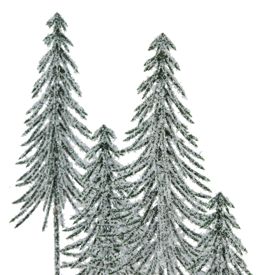 Miniature winter forest display with four snow-dusted spindle trees on rustic wood log base, natural brown and white accents. by Sostter at brixbailey.com