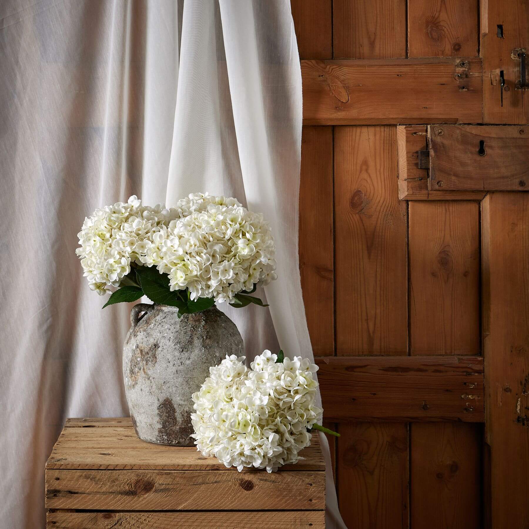 Lifelike white hydrangea arrangement in antique white vase, realistic plastic flowers for home decor by Sostter at brixbailey.com