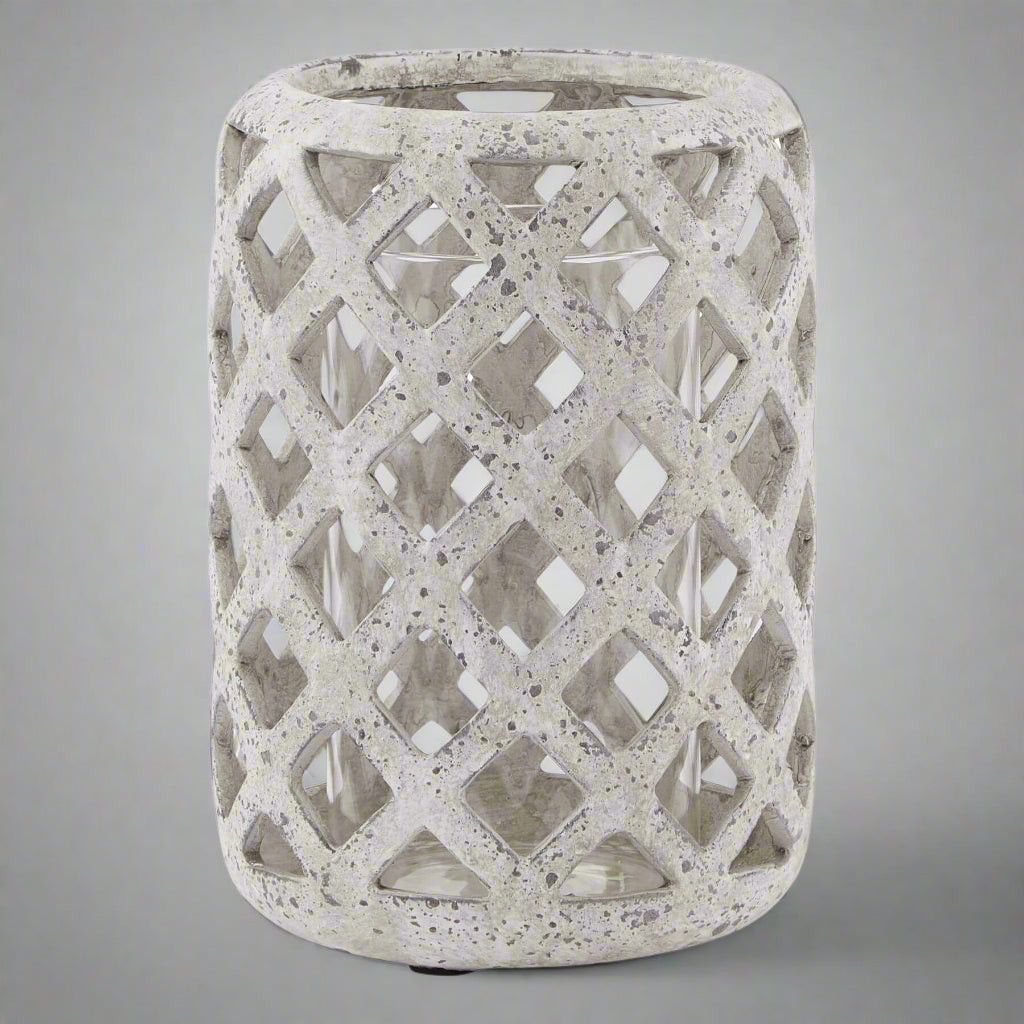 Matte grey stone-effect ceramic hurricane lantern with rustic texture and modern silhouette for home decor by Sostter at brixbailey.com