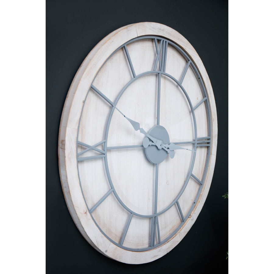 Large white wall clock with roman numerals, metal frame, and wood surround for modern or traditional decor by Sostter at brixbailey.com