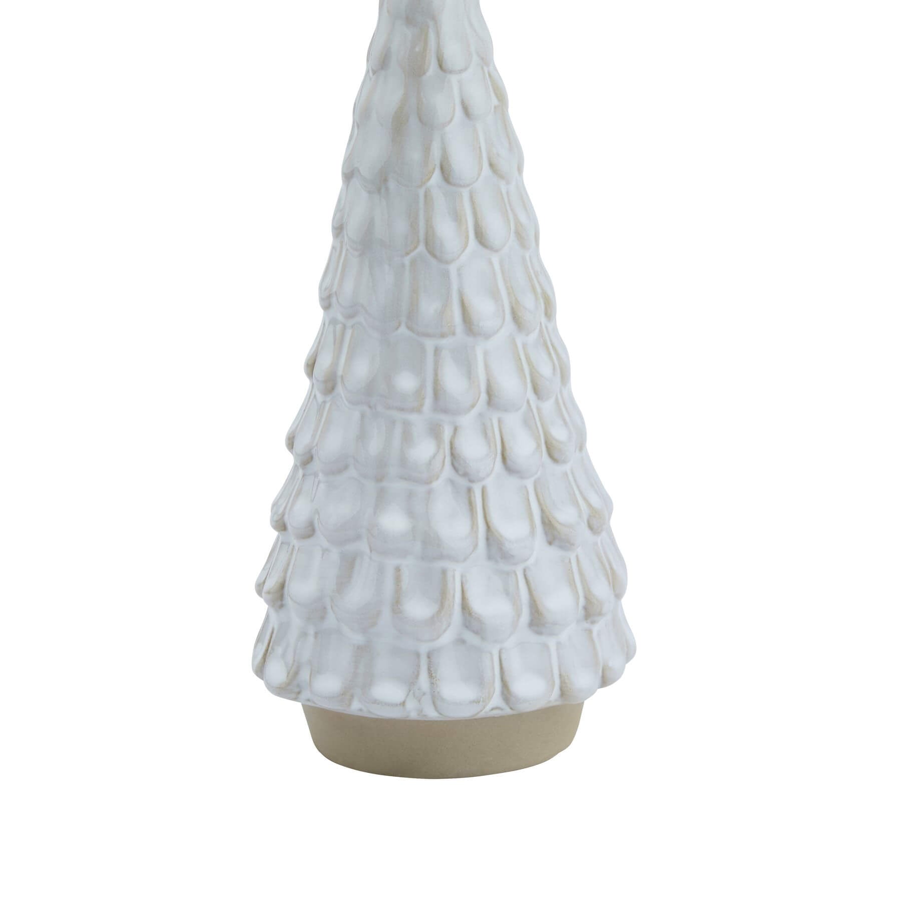 White ceramic winter decoration with intricate spruce silhouette, perfect for holiday decor by Sostter at brixbailey.com