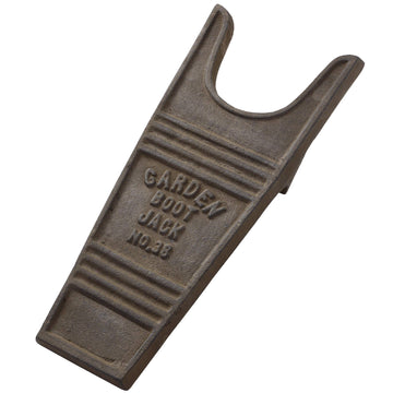 Handcrafted cast iron boot jack with rustic brown patina for effortless boot removal by Sostter at brixbailey.com
