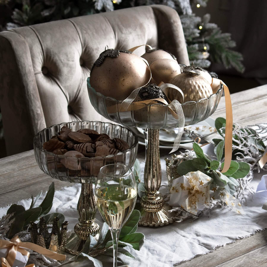 Silver mercury glass bowl with reflective finish, perfect for centerpieces or decorative displays, 23cm height. by Sostter at brixbailey.com