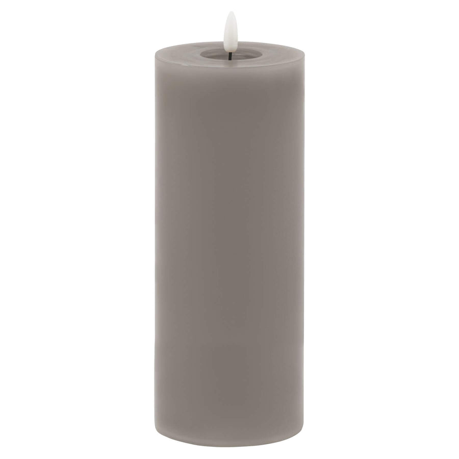 Grey LED wax candle with realistic flickering flame and dripped-wax texture, 23cm tall, battery-operated for safe ambiance (124 chars) by Hill Interiors at brixbailey.com