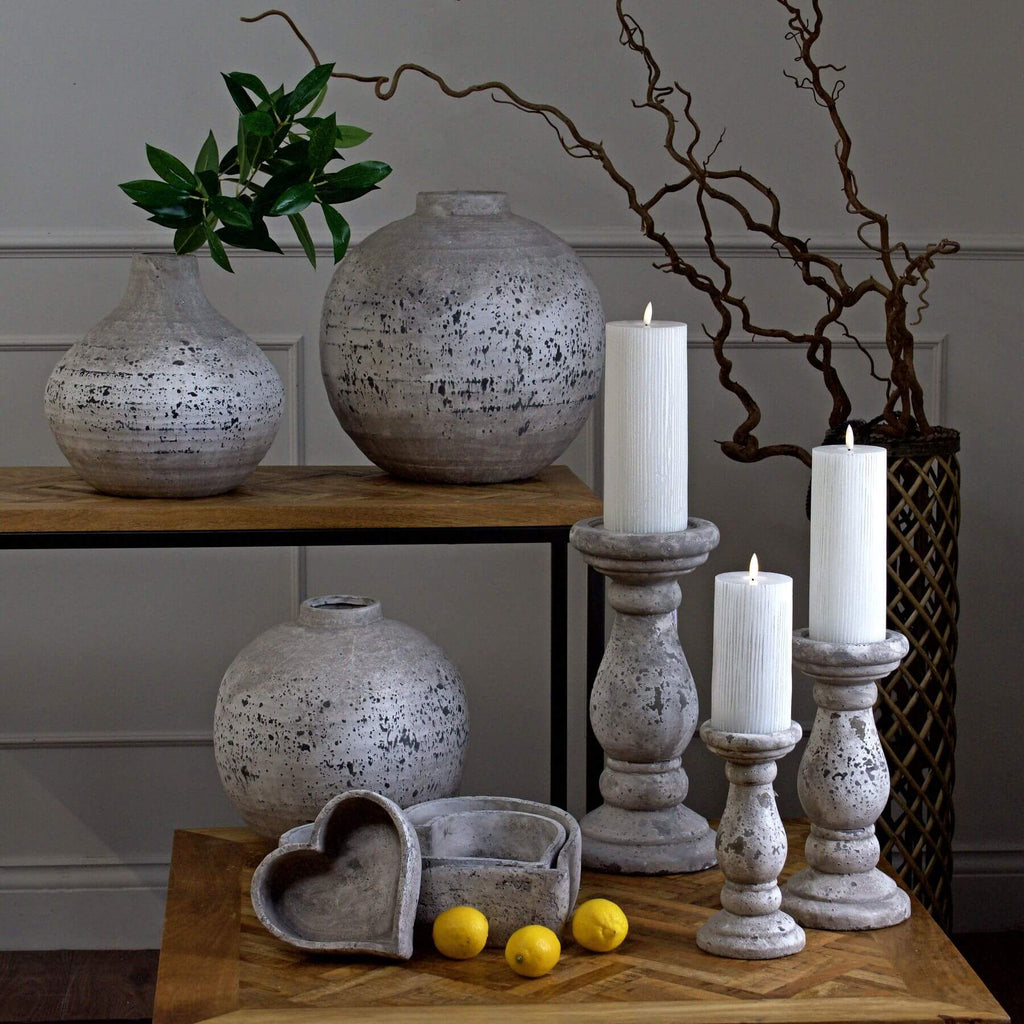 Handcrafted 34cm stone ceramic candle holder with weathered finish for rustic farmhouse or coastal decor. by Sostter at brixbailey.com