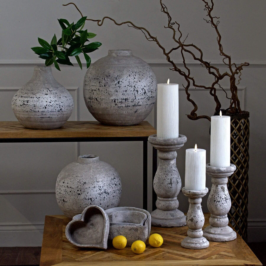Handcrafted 34cm stone ceramic candle holder with weathered finish for rustic farmhouse or coastal decor. by Sostter at brixbailey.com